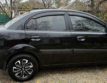 Чорний Кіа Ріо, об'ємом двигуна 1.4 л та пробігом 200 тис. км за 5000 $, фото 2 на Automoto.ua