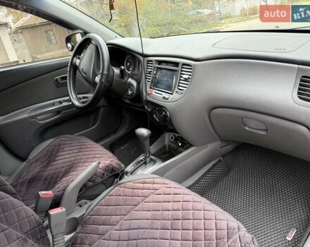 Чорний Кіа Ріо, об'ємом двигуна 1.4 л та пробігом 200 тис. км за 5000 $, фото 7 на Automoto.ua