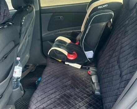 Чорний Кіа Ріо, об'ємом двигуна 1.4 л та пробігом 213 тис. км за 5100 $, фото 10 на Automoto.ua