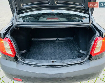 Черный Киа Рио, объемом двигателя 1.4 л и пробегом 297 тыс. км за 3999 $, фото 24 на Automoto.ua