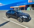 Черный Киа Рио, объемом двигателя 1.4 л и пробегом 187 тыс. км за 4300 $, фото 1 на Automoto.ua