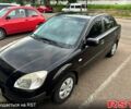 Черный Киа Рио, объемом двигателя 1.4 л и пробегом 252 тыс. км за 3600 $, фото 1 на Automoto.ua