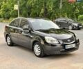 Чорний Кіа Ріо, об'ємом двигуна 1.4 л та пробігом 252 тис. км за 4750 $, фото 9 на Automoto.ua