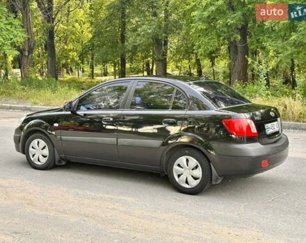 Чорний Кіа Ріо, об'ємом двигуна 1.4 л та пробігом 252 тис. км за 4750 $, фото 7 на Automoto.ua