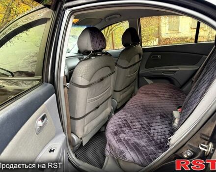 Черный Киа Рио, объемом двигателя 1.4 л и пробегом 199 тыс. км за 5500 $, фото 1 на Automoto.ua
