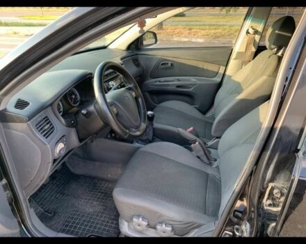 Черный Киа Рио, объемом двигателя 1.4 л и пробегом 210 тыс. км за 4400 $, фото 3 на Automoto.ua