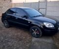 Чорний Кіа Ріо, об'ємом двигуна 1.4 л та пробігом 320 тис. км за 4400 $, фото 2 на Automoto.ua
