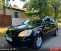 Чорний Кіа Ріо, об'ємом двигуна 1.4 л та пробігом 235 тис. км за 3200 $, фото 8 на Automoto.ua