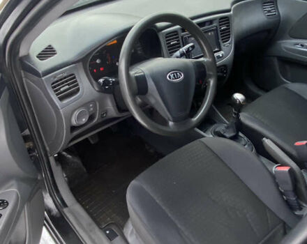 Черный Киа Рио, объемом двигателя 1.4 л и пробегом 358 тыс. км за 3750 $, фото 7 на Automoto.ua