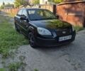 Черный Киа Рио, объемом двигателя 1.4 л и пробегом 270 тыс. км за 3868 $, фото 2 на Automoto.ua