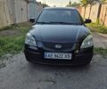 Черный Киа Рио, объемом двигателя 1.4 л и пробегом 270 тыс. км за 3868 $, фото 1 на Automoto.ua