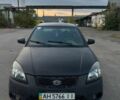 Чорний Кіа Ріо, об'ємом двигуна 1.4 л та пробігом 200 тис. км за 1803 $, фото 1 на Automoto.ua