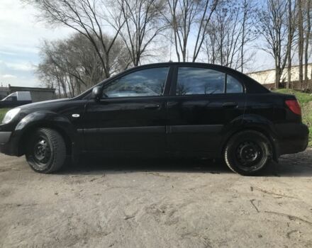Чорний Кіа Ріо, об'ємом двигуна 1.4 л та пробігом 240 тис. км за 4600 $, фото 7 на Automoto.ua