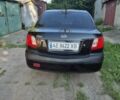 Черный Киа Рио, объемом двигателя 1.4 л и пробегом 270 тыс. км за 3868 $, фото 4 на Automoto.ua
