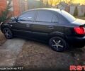 Чорний Кіа Ріо, об'ємом двигуна 1.4 л та пробігом 320 тис. км за 4400 $, фото 1 на Automoto.ua