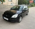Черный Киа Рио, объемом двигателя 1.34 л и пробегом 248 тыс. км за 5500 $, фото 1 на Automoto.ua