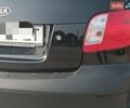 Черный Киа Рио, объемом двигателя 1.4 л и пробегом 196 тыс. км за 4200 $, фото 2 на Automoto.ua