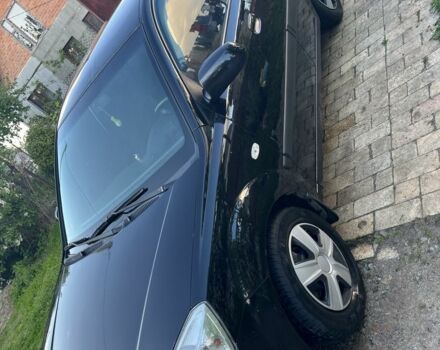 Черный Киа Рио, объемом двигателя 1.4 л и пробегом 249 тыс. км за 3500 $, фото 4 на Automoto.ua