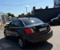 Черный Киа Рио, объемом двигателя 1.4 л и пробегом 235 тыс. км за 3200 $, фото 6 на Automoto.ua