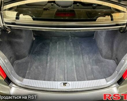 Чорний Кіа Ріо, об'ємом двигуна 1.4 л та пробігом 230 тис. км за 5800 $, фото 11 на Automoto.ua