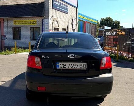 Чорний Кіа Ріо, об'ємом двигуна 1.4 л та пробігом 235 тис. км за 3200 $, фото 3 на Automoto.ua