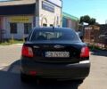 Чорний Кіа Ріо, об'ємом двигуна 1.4 л та пробігом 235 тис. км за 3200 $, фото 3 на Automoto.ua