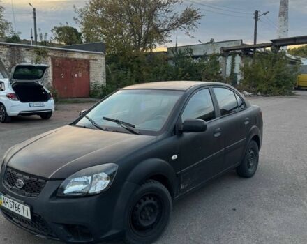 Чорний Кіа Ріо, об'ємом двигуна 1.4 л та пробігом 200 тис. км за 1803 $, фото 1 на Automoto.ua