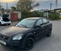 Чорний Кіа Ріо, об'ємом двигуна 1.4 л та пробігом 200 тис. км за 1803 $, фото 1 на Automoto.ua