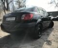 Чорний Кіа Ріо, об'ємом двигуна 1.4 л та пробігом 240 тис. км за 4600 $, фото 5 на Automoto.ua