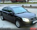 Чорний Кіа Ріо, об'ємом двигуна 1.4 л та пробігом 230 тис. км за 5800 $, фото 1 на Automoto.ua
