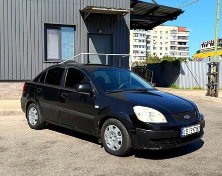 Чорний Кіа Ріо, об'ємом двигуна 1.4 л та пробігом 235 тис. км за 3200 $, фото 1 на Automoto.ua