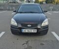Чорний Кіа Ріо, об'ємом двигуна 1.4 л та пробігом 350 тис. км за 3350 $, фото 1 на Automoto.ua