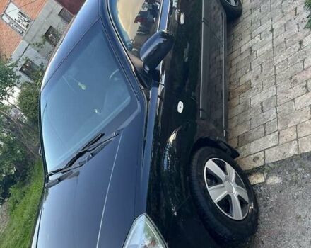 Чорний Кіа Ріо, об'ємом двигуна 1.4 л та пробігом 249 тис. км за 3500 $, фото 2 на Automoto.ua