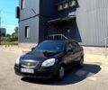 Чорний Кіа Ріо, об'ємом двигуна 1.4 л та пробігом 235 тис. км за 3200 $, фото 1 на Automoto.ua