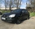 Чорний Кіа Ріо, об'ємом двигуна 1.4 л та пробігом 240 тис. км за 4600 $, фото 1 на Automoto.ua