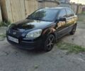 Черный Киа Рио, объемом двигателя 1.4 л и пробегом 270 тыс. км за 3868 $, фото 1 на Automoto.ua