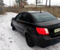 Черный Киа Рио, объемом двигателя 1.4 л и пробегом 760 тыс. км за 2500 $, фото 2 на Automoto.ua
