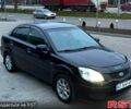Чорний Кіа Ріо, об'ємом двигуна 1.4 л та пробігом 230 тис. км за 5800 $, фото 1 на Automoto.ua