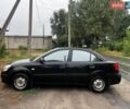 Чорний Кіа Ріо, об'ємом двигуна 1.4 л та пробігом 245 тис. км за 3900 $, фото 1 на Automoto.ua
