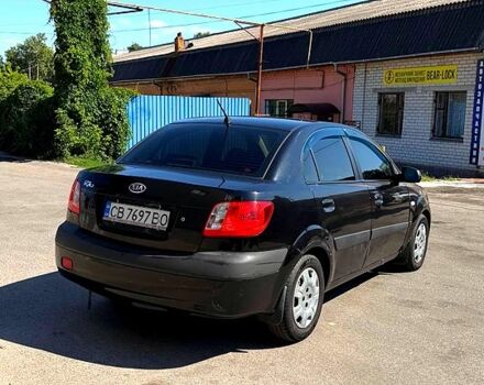 Чорний Кіа Ріо, об'ємом двигуна 1.4 л та пробігом 235 тис. км за 3200 $, фото 6 на Automoto.ua