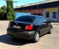 Чорний Кіа Ріо, об'ємом двигуна 1.4 л та пробігом 235 тис. км за 3200 $, фото 6 на Automoto.ua