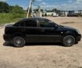 Черный Киа Рио, объемом двигателя 1.4 л и пробегом 135 тыс. км за 5500 $, фото 6 на Automoto.ua