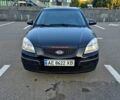 Черный Киа Рио, объемом двигателя 1.4 л и пробегом 350 тыс. км за 3550 $, фото 1 на Automoto.ua