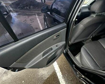 Черный Киа Рио, объемом двигателя 1.49 л и пробегом 152 тыс. км за 3500 $, фото 24 на Automoto.ua