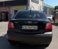 Черный Киа Рио, объемом двигателя 1.4 л и пробегом 235 тыс. км за 3200 $, фото 7 на Automoto.ua