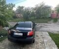 Чорний Кіа Ріо, об'ємом двигуна 1.4 л та пробігом 249 тис. км за 3500 $, фото 1 на Automoto.ua