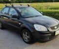 Черный Киа Рио, объемом двигателя 1.4 л и пробегом 328 тыс. км за 3450 $, фото 1 на Automoto.ua