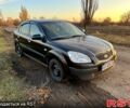 Черный Киа Рио, объемом двигателя 1.4 л и пробегом 433 тыс. км за 3100 $, фото 1 на Automoto.ua