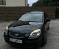 Черный Киа Рио, объемом двигателя 1.4 л и пробегом 200 тыс. км за 4005 $, фото 1 на Automoto.ua