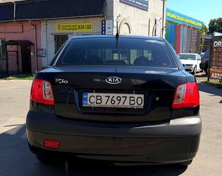 Чорний Кіа Ріо, об'ємом двигуна 1.4 л та пробігом 235 тис. км за 3200 $, фото 5 на Automoto.ua